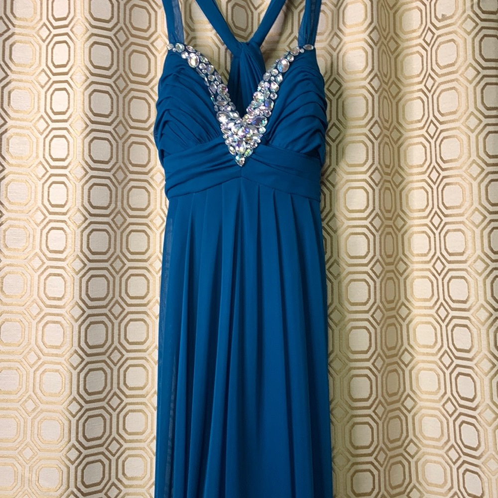 Beautiful and sexy TEAL dress. Backless with front slit